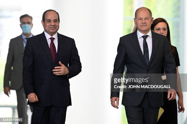 German Chancellor Olaf Scholz arrives together with Egypt's President Abdel Fattah al-Sisi for a press conference at the Chancellery in Berlin on...