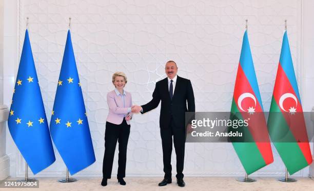 Azerbaijani President Ilham Aliyev and European Commission President Ursula Von der Leyen shakes hands after signing a memorandum of understanding on...
