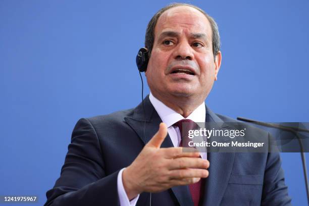 Egyptian President Abdel Fattah el-Sisi speaks during a joint press conference with German Chancellor Olaf Scholz at the federal chancellery on July...