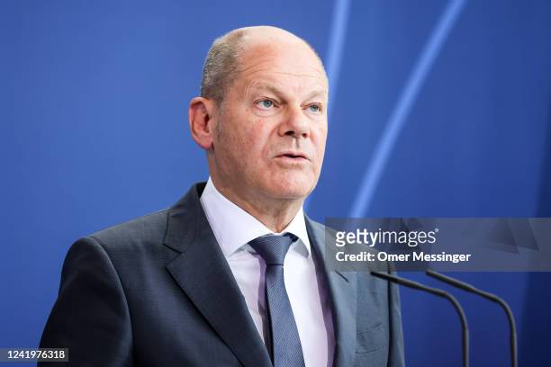 German Chancellor Olaf Scholz and Egyptian President Abdel Fattah el-Sisi attend a joint press conference at the federal chancellery on July 18, 2022...