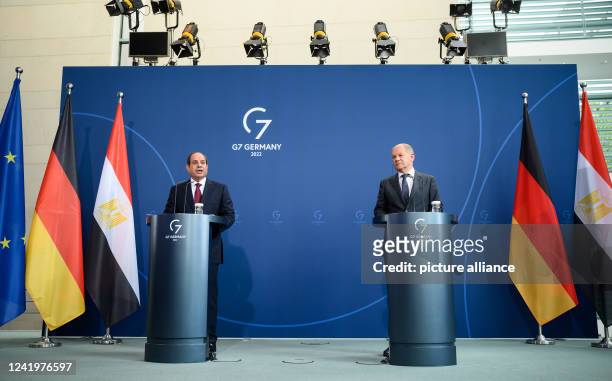German Chancellor Olaf Scholz and Abdel Fattah al-Sisi, President of Egypt, make remarks at a press conference after their talks at the Chancellor's...