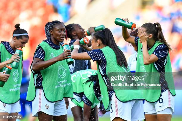 Selma BACHA OF France sprays water on her face to refresh herself prior to the UEFA Women's European Championship Group Stage - Group D match between...