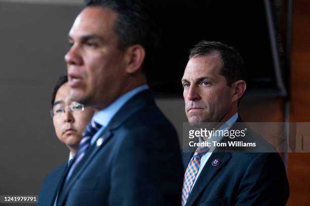 From right, Reps. Jason Crow, D-Colo., Pete Aguilar, D-Calif., and Andy Kim, D-N.J., conduct a news conference after a meeting of the House...