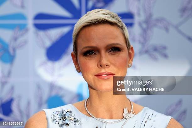 Princess Charlene of Monaco poses upon her arrival for the 73rd edition of the Red Cross Gala at the Casino in Monte Carlo on July 18, 2022.