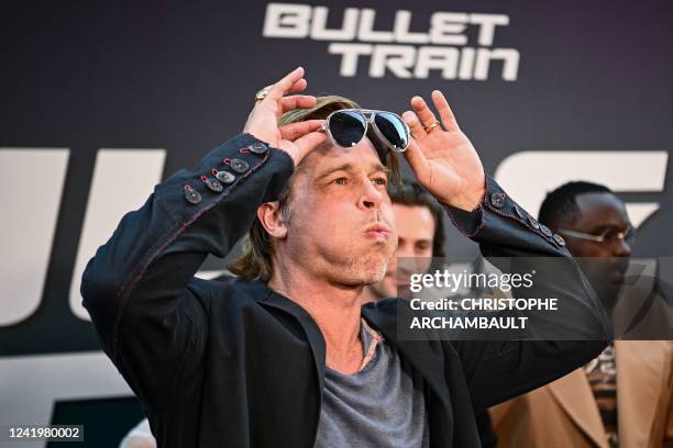 Actor Brad Pitt reacts during a preview of the film in Paris on July 18, 2022. - Come to present the comedy "Bullet Train", in theatres starting from...