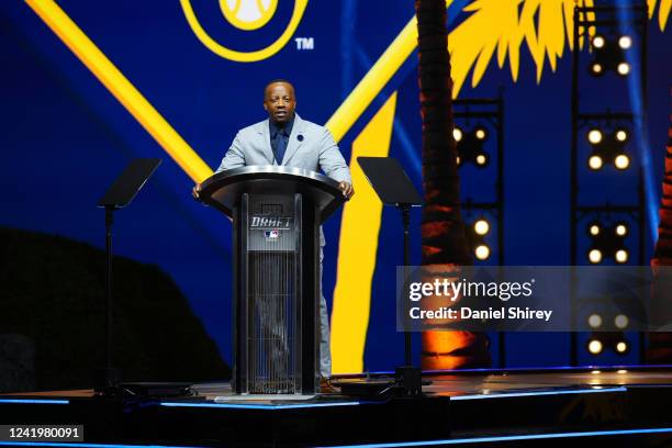 Club representative Rickie Weeks announces a selection by the Milwaukee Brewers during the 2022 Major League Baseball Draft at L.A. Live on Sunday,...