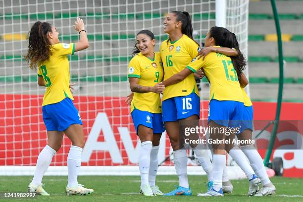Bia Zaneratto of Brazil celebrates with teammates after scoring the first goal of her team during a match between Venezuela and Brazil as part of...