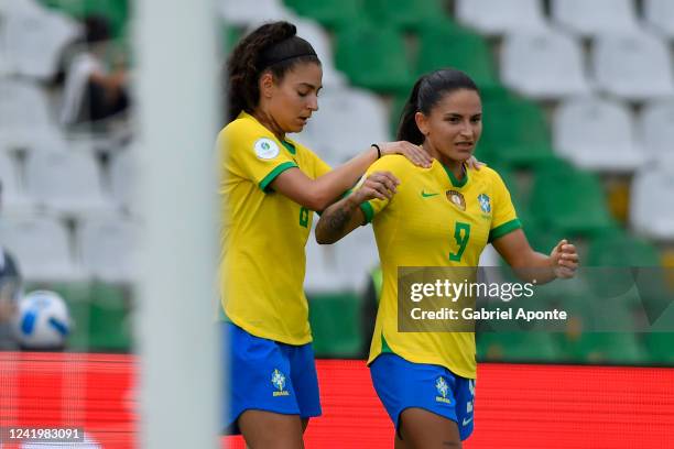 Debinha of Brazil celebrates with teammate after scoring the fourth goal of her team during a match between Venezuela and Brazil as part of Women's...
