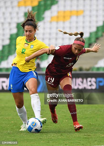 Brazil's Angelina and Venezuela's Mariana Speckmaier vie for the ball during their Conmebol 2022 women's Copa America football tournament match at...