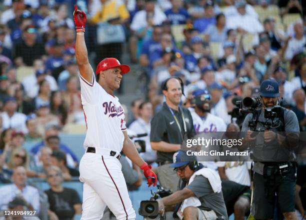 Washington Nationals' Juan Soto celebrates after defeating Cleveland Indians' Jose Ramirez with 18 home runs to advance to the second round during...