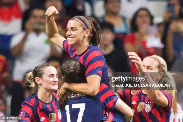 S Alex Morgan celebrates with teammates after scoring against Canada during their 2022 Concacaf women's championship final football match, at the...