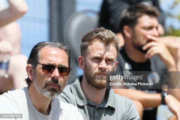 Head of football operations for Swansea City, Josh Marsh watches the game during the Pre-Season Friendly match between Swansea City and Bristol...