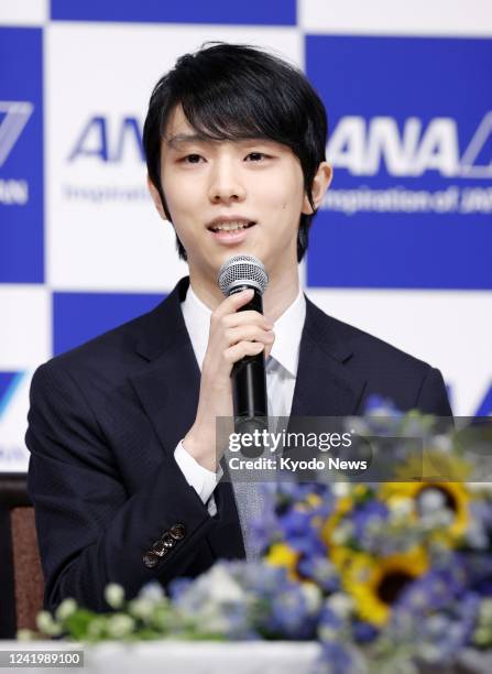 Two-time Olympic figure skating gold medalist Yuzuru Hanyu announces his retirement from competition at a press conference in Tokyo on July 19, 2022.