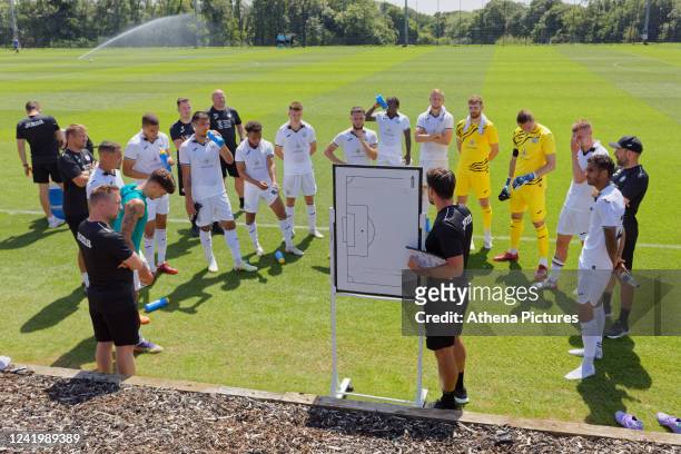 Manager Russell Martin of Swansea City speaks to his players during the Pre-Season Friendly match between Swansea City and Bristol Rovers at Fairwood...