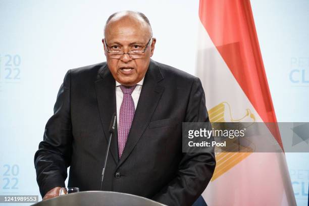Egyptian Foreign Minister Sameh Shoukry speaks next to German Foreign Minister Annalena Baerbock during the closing press conference of a Petersberg...