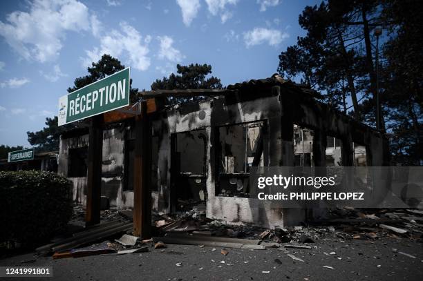 Picture taken on July 19, 2022 shows the camping reception which has been ravaged by a wildfire in Pyla sur Mer in Gironde, southwestern France. -...