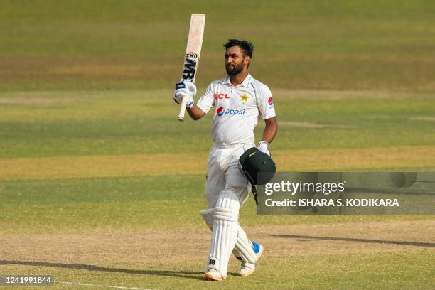 Pakistans Abdullah Shafique celebrates after scoring a century during the fourth day of the first cricket Test match between Sri Lanka and Pakistan...