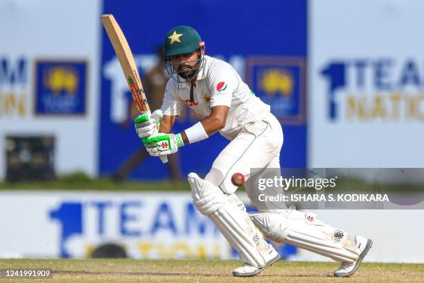 Pakistans Babar Azam plays a shot during the fourth day of the first cricket Test match between Sri Lanka and Pakistan at the Galle International...