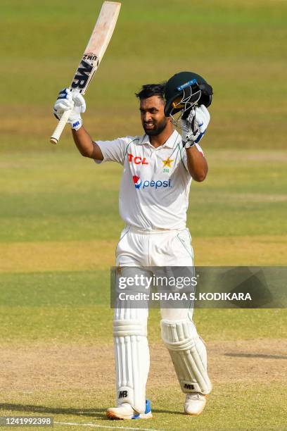 Pakistans Abdullah Shafique celebrates after scoring a century during the fourth day of the first cricket Test match between Sri Lanka and Pakistan...