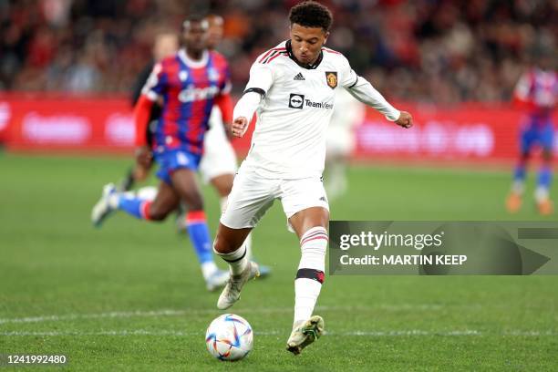 Manchester United's Jadon Sancho scores against Crystal palace during the pre-season football match between English Premier League teams Manchester...