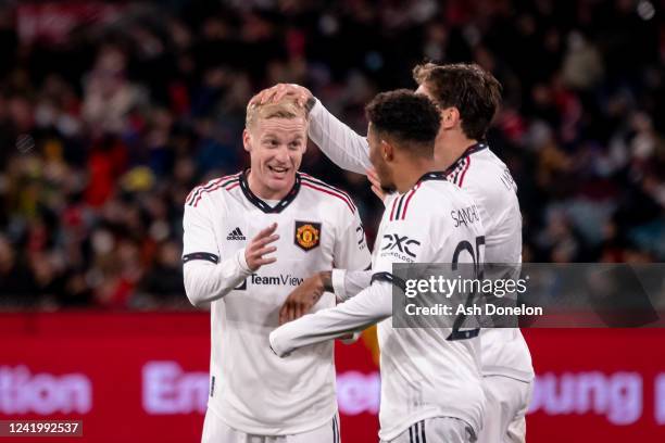 Donny van de Beek of Manchester United celebrates with his team-mates during the Pre-Season Friendly match between Manchester United and Crystal...