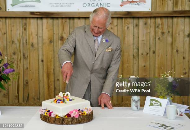 Prince Charles, Prince of Wales cuts a celebratory cake at the Innovative Farmers 10th anniversary at Trefranck Farm, Nr Launceston in Cornwall on...