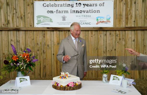 Prince Charles, Prince of Wales cuts a celebratory cake at the Innovative Farmers 10th anniversary at Trefranck Farm, Nr Launceston in Cornwall on...