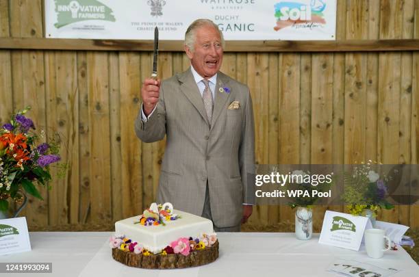 Prince Charles, Prince of Wales cuts a celebratory cake at the Innovative Farmers 10th anniversary at Trefranck Farm, Nr Launceston in Cornwall on...