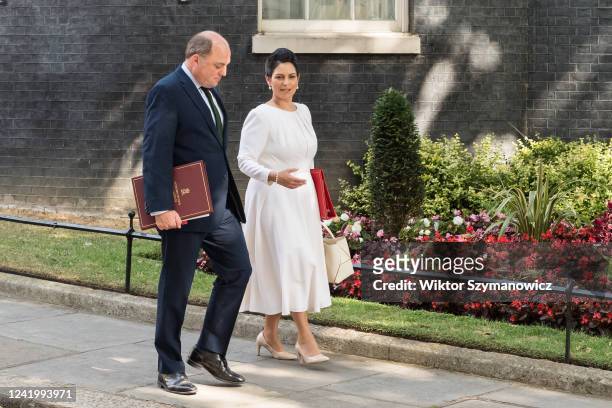 Secretary of State for Defence Ben Wallace and Secretary of State for the Home Department Priti Patel leaves Downing Street after attending the...