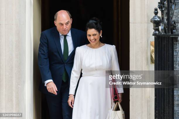 Secretary of State for Defence Ben Wallace and Secretary of State for the Home Department Priti Patel leaves Downing Street after attending the...