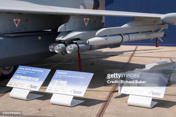 Systems Typhoon jet fighter, exhibited with missile and smart bomb systems, at the Farnborough Airshow, on 18th July 2022, at Farnborough, England....