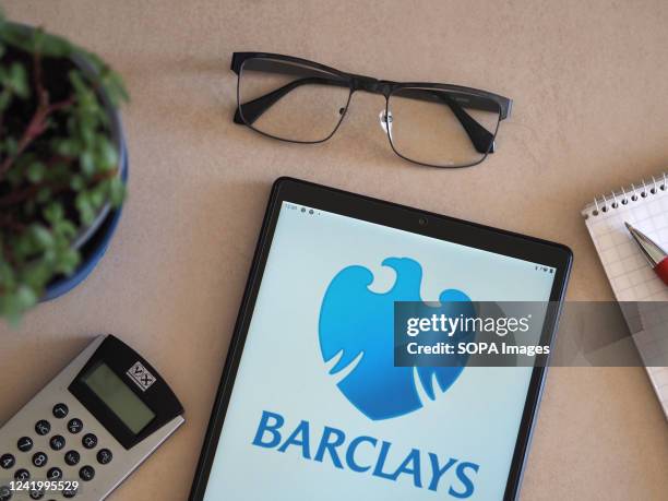 In this photo illustration, Barclays plc logo seen displayed on a tablet.