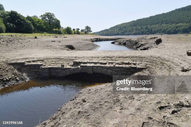 The ruins of a footbridge in Derwent Village, flooded in the 1940s to provide drinking water for the East Midlands and Sheffield, exposed due to the...