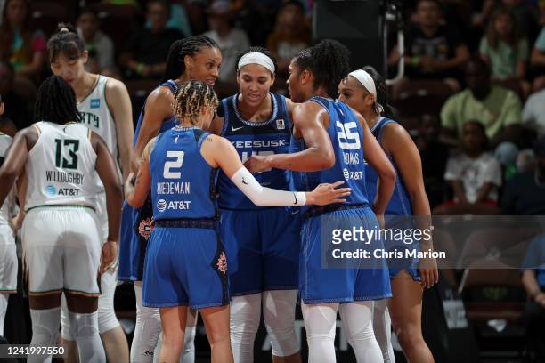 The Connecticut Sun huddle during the game against the New York Liberty on July 19, 2022 at Mohegan Sun Arena in Uncasville, Connecticut. NOTE TO...