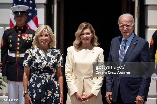 First lady Jill Biden, first lady of Ukraine Olena Zelenska and U.S. President Joe Biden pose for photos as Zelenska arrives on the South Lawn of the...