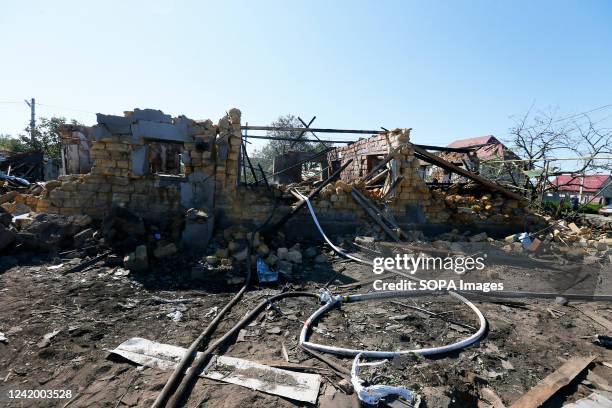 Firemen and damaged buildings are seen following a Russian rocket attack in a village in the Odessa region. According to Odesa Military...