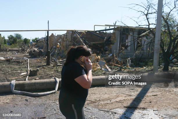 Local woman walks past a damaged building following a Russian rocket attack in a village in the Odessa region. According to Odesa Military...