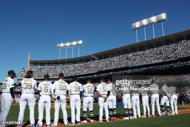 Members of the National League line the base path prior to the 92nd MLB All-Star Game presented by Mastercard at Dodger Stadium on Tuesday, July 19,...