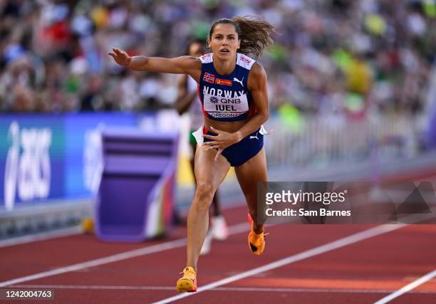 Oregon , United States - 19 July 2022; Amalie Iuel of Norway dips for the line in her Women's 400m Hurdles heat during day five of the World...
