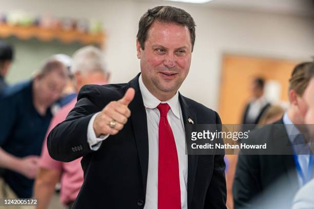 Dan Cox, a candidate for the Republican gubernatorial nomination, greets supporters during a primary election night event on July 19, 2022 in...