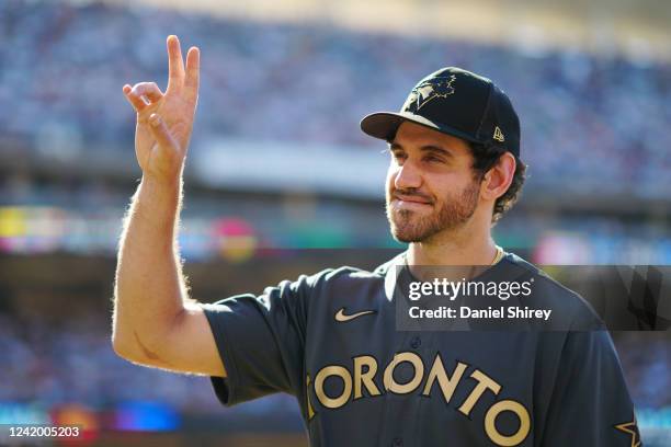 Jordan Romano of the Toronto Blue Jays acknowledges the crowd during player introductions prior to the 92nd MLB All-Star Game presented by Mastercard...