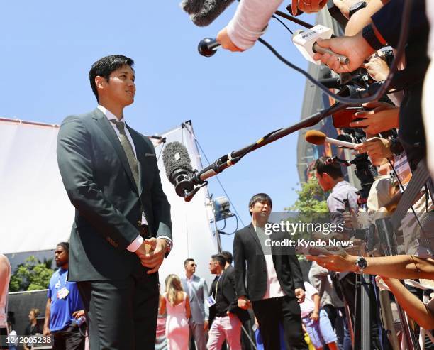 Los Angeles Angels two-way player Shohei Ohtani meets the press during the Red Carpet Show before the MLB All-Star baseball game on July 19 at Dodger...