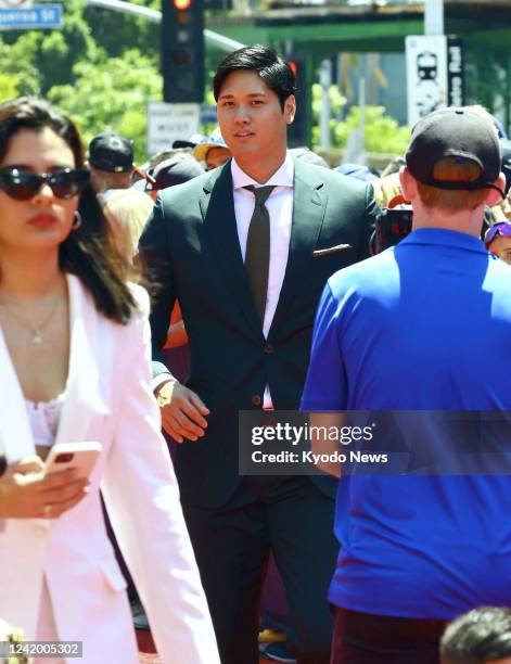 Los Angeles Angels two-way player Shohei Ohtani appears in the Red Carpet Show before the MLB All-Star baseball game on July 19 at Dodger Stadium in...