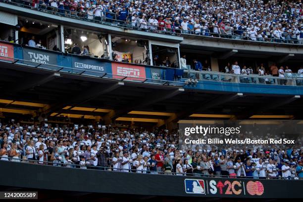 Fans display signs during a Stand Up 2 Cancer ceremony during the 92nd MLB All-Star Game presented by Mastercard on July 19, 2022 at Dodger Stadium...