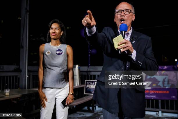 Tom Perez speaks alongside Shannon Sneed during a primary election night event at Tommy Joe's on July 19, 2022 in Bethesda, Maryland. Perez, the...
