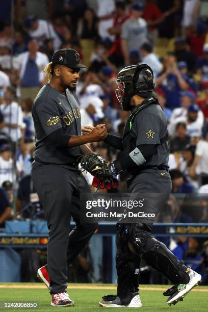 Emmanuel Clase of the Cleveland Guardians celebrates with Jose Trevino of the New York Yankees after the American League defeated the National...