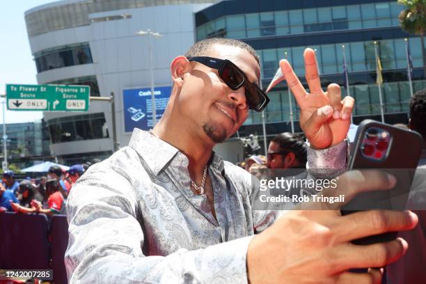 Julio Rodríguez of the Seattle Mariners takes a selfie during the 92nd MLB All-Star Game presented by Mastercard at Dodger Stadium on Tuesday, July...