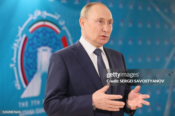 Russian President Vladimir Putin answers journalists' questions following a trilateral meeting on Syria with his Iranian and Turkish counterparts in...