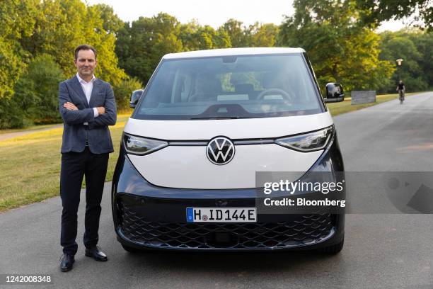 Thomas Schaefer, chief executive officer of Volkswagen AG's VW brand, next to a VW ID Buzz electric microbus in Wolfsburg, Germany, on Wednesday,...