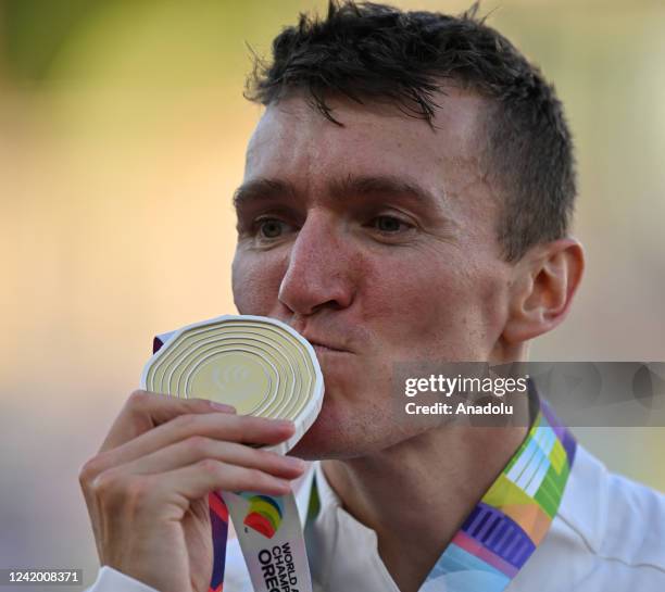 Gold medalist Jake Wightman of Team Great Britain poses during the medal ceremony for the Men's 1500m Final at the eighteenth edition of the World...